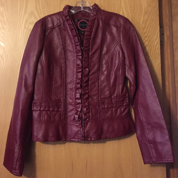 Dark red faux leather jacket.