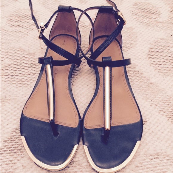 Super cute black/ gold sandals!