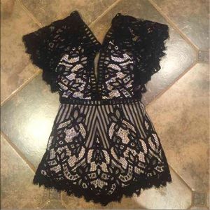 Romper. Black lace with nude underlay.