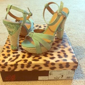 A Fiesta Frenzy heel brand new in a box.