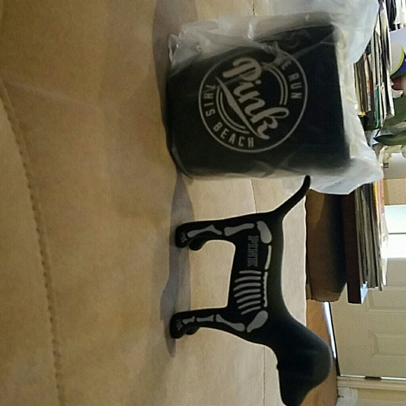 Pink cup holder with a dog.