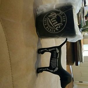 Pink cup holder with a dog.