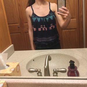 A multi colored tank top.