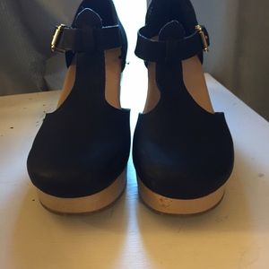 Black T strap clogs