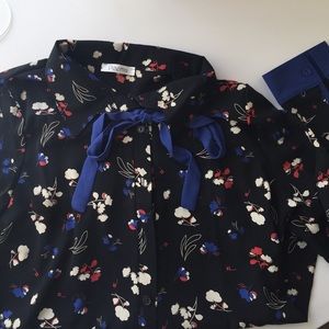 Floral blouse with bow tie collar
