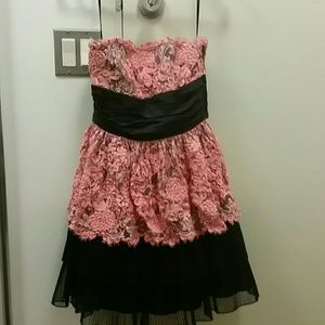 Strapless pink and black mini dress