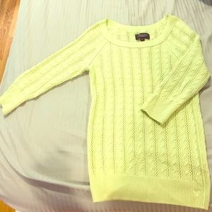 American Eagle green sweater.
