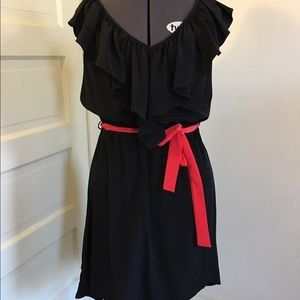 Black dress with red sash belt.