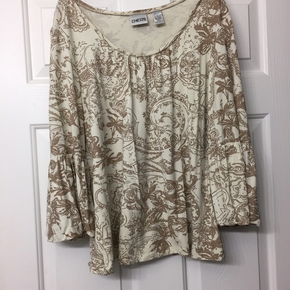 Chico's Stylish bell sleeved top. Dress up or down