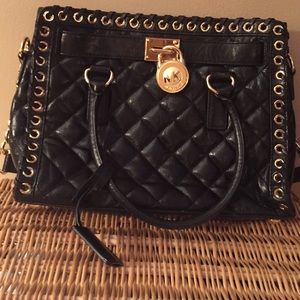 Michael Kors black and gold handbag