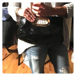 Gently used michael kors clutch