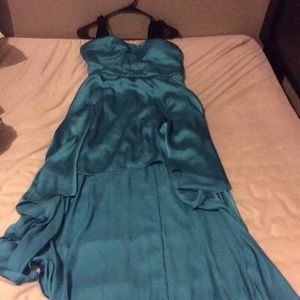 A turquoise silky dress