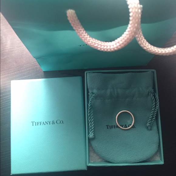 Tiffany and co. Silver I love you band.
