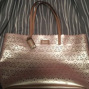 Metallic pink Coach purse