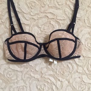 Pink and black lace bra