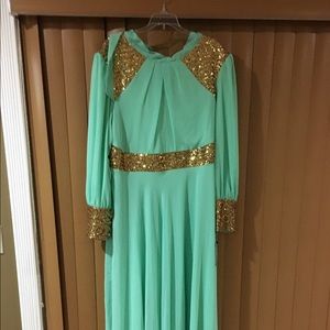 Mint long sleeve evening gown bran new with tags