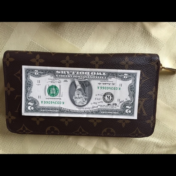 Louis Vuitton large zippered wallet.