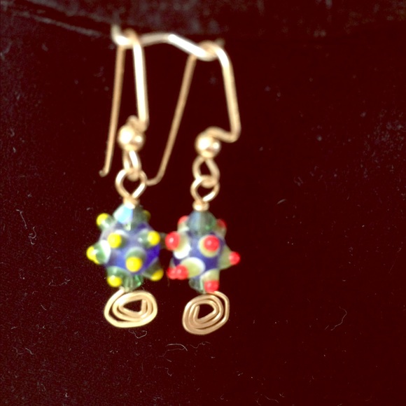 Unmatched  lauscha glass bead earrings