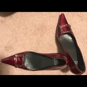 Stuart Weitzman burgundy patent leather pumps
