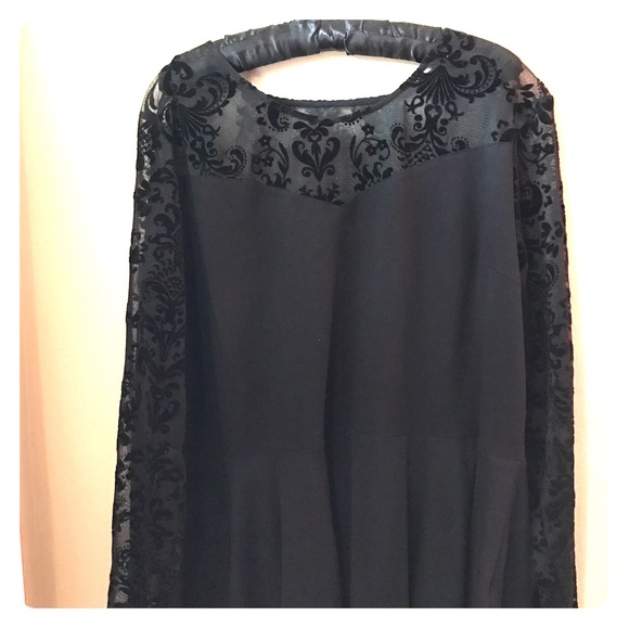 Plus size peplum top with lace bodice and sleeves