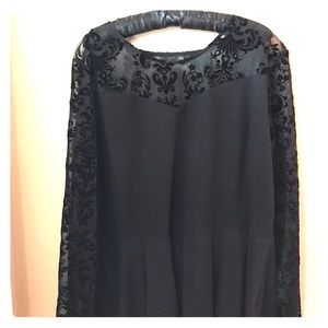 Plus size peplum top with lace bodice and sleeves