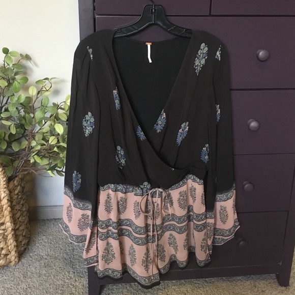 Free People romper- never warn
