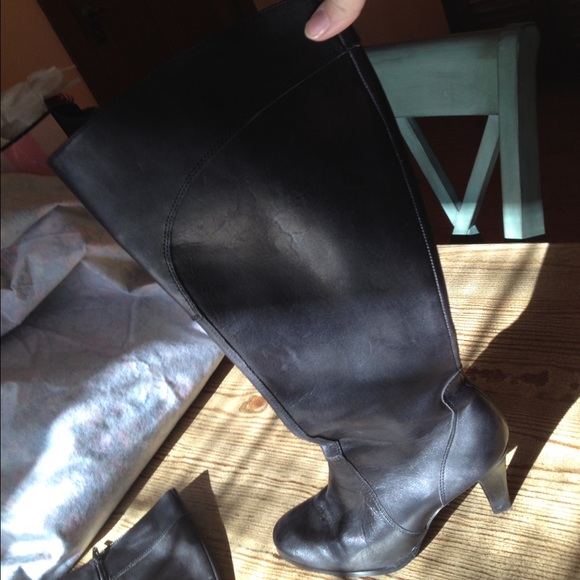 Tall black leather boots