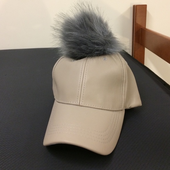 Nude grey puff ball hat never worn.