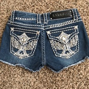 L.A. Idol winged cross cutoffs