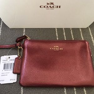 2 Coach wrist handbag