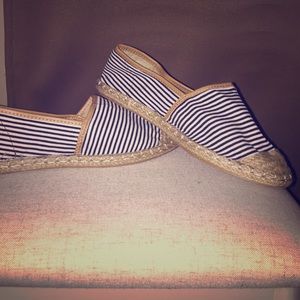 Navy and white cloth shoes.