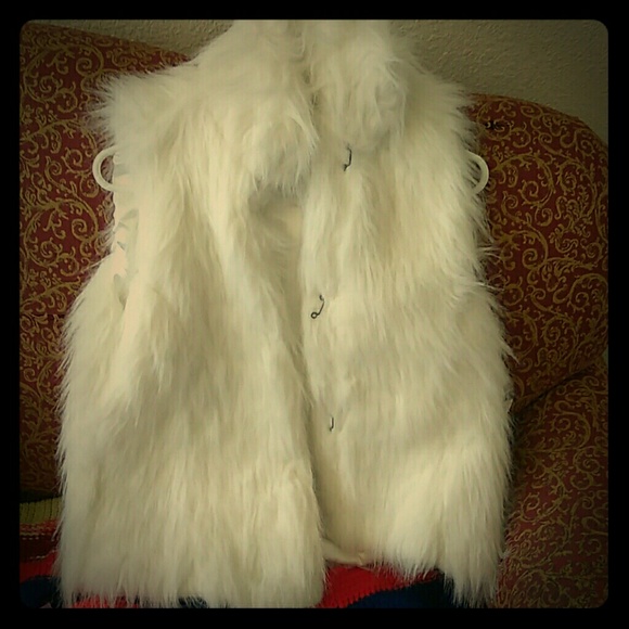 White fur vest