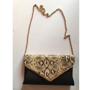 Neiman Marcus V Frame Clutch