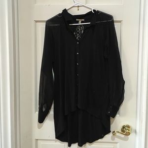 Long black short. Looks great with skinny jeans.
