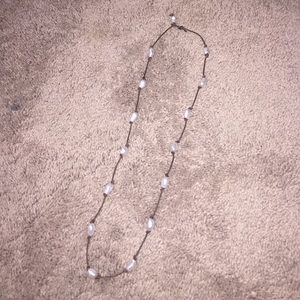 Long pearl necklace