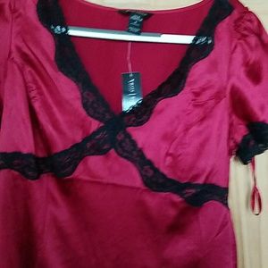 Silk stretch red vneck with black lace trim blouse