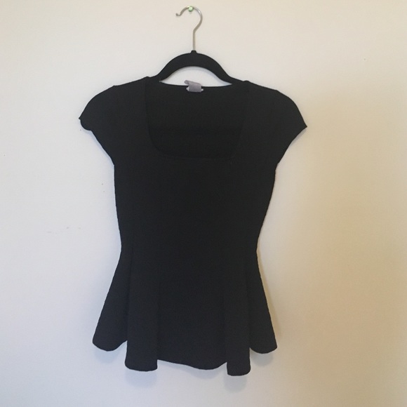 Nice peplum shirt.