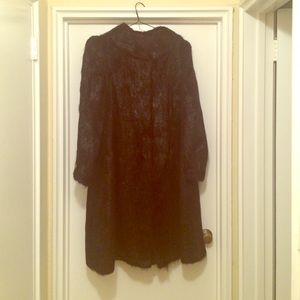Full-length black fur coat