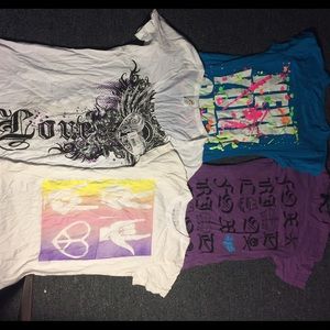 4 graphic tees & 2 sweaters.