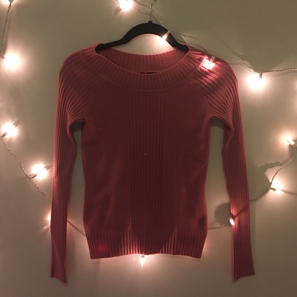Pink sweater.