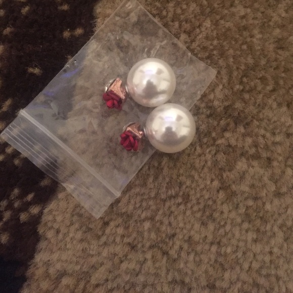 Red rose, blue rose double sided earrings.