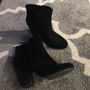 Black fringed ankle boots