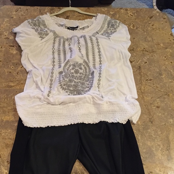 Faux leather pants and INC blouse.