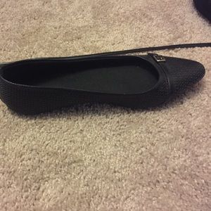 Black flats with silver buckle