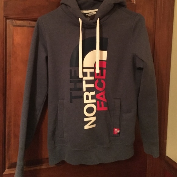 Blue north face hoodie with large logo