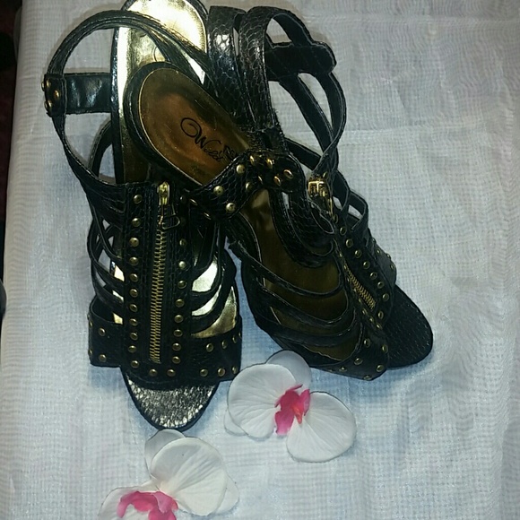 Gold studded heels with zipper detail