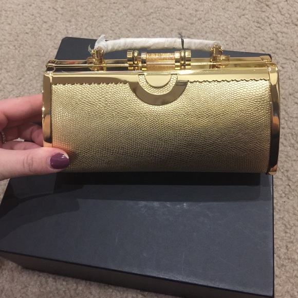 Beautiful brand new gold clutch