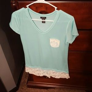 Sky blue, lace shirt.