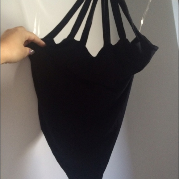 Naked Wardrobe black onesie never been worn