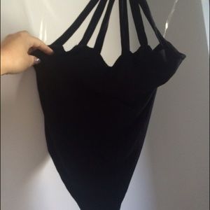 Naked Wardrobe black onesie never been worn